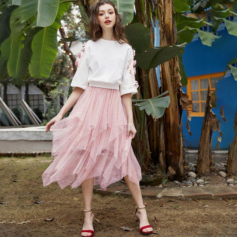 Traje de falda para primavera, una falda con un sudadero